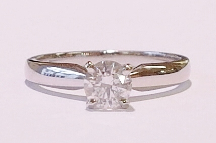 Platinum and diamond solitaire ring