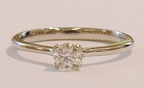Platinum and diamond solitaire ring