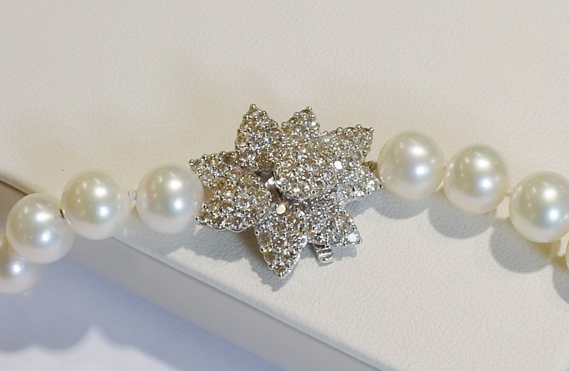 Cultured pearl strand with diamond set clasp