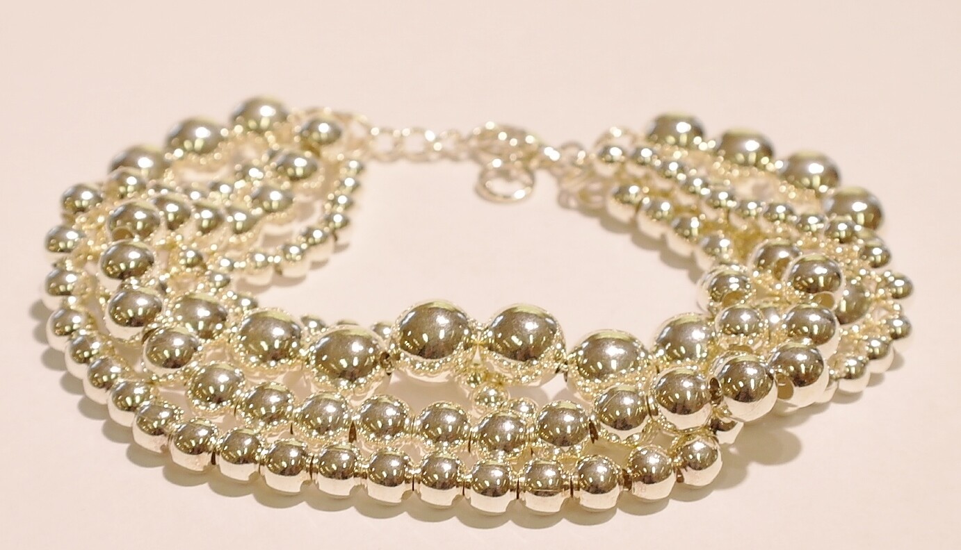 Silver four strand bracelet