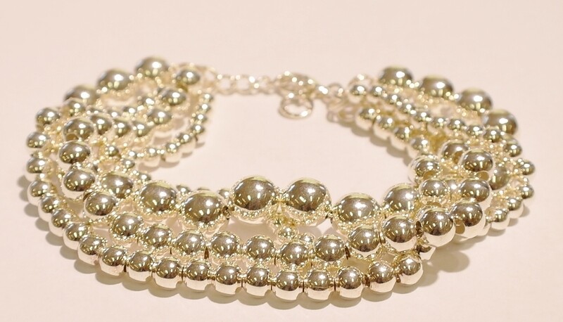 Silver four strand bracelet