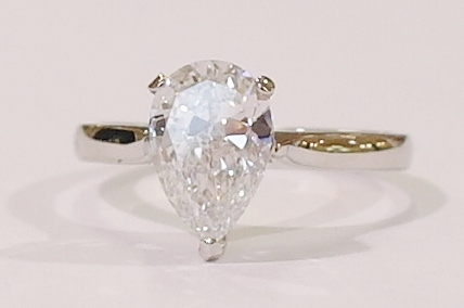 Platinum pear shape diamond ring