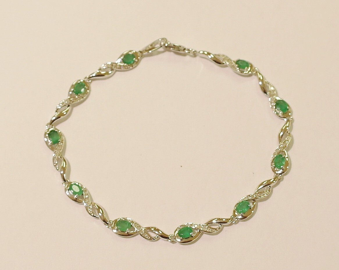 9ct white gold emerald and diamond bracelet