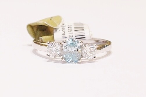 Oval Treated Blue Diamond Three stone ring