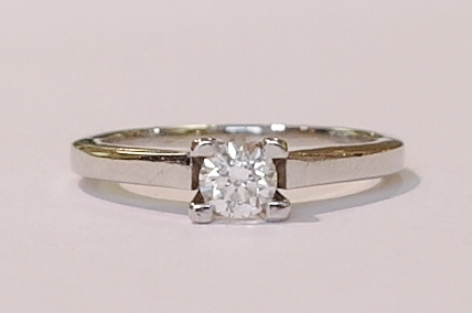 Platinum and diamond solitaire ring