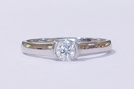 Platinum and diamond solitaire ring