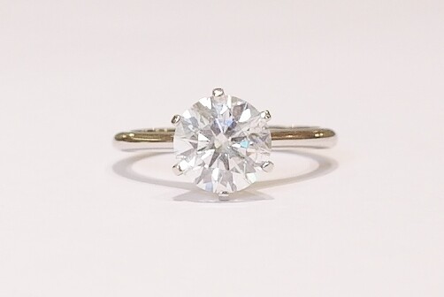 Platinum and diamond solitaire ring