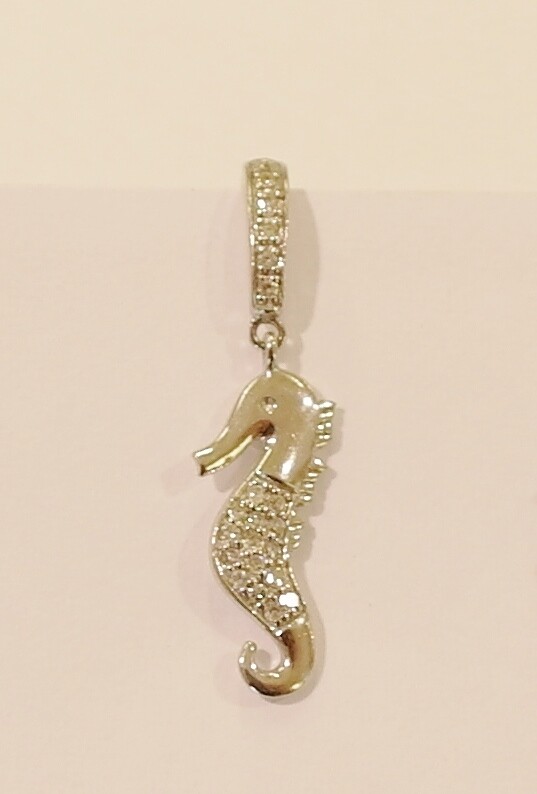 9ct white gold and diamond charm/pendant