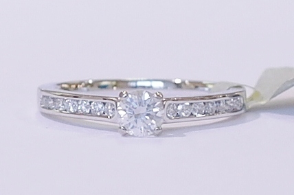 Platinum and diamond solitaire ring