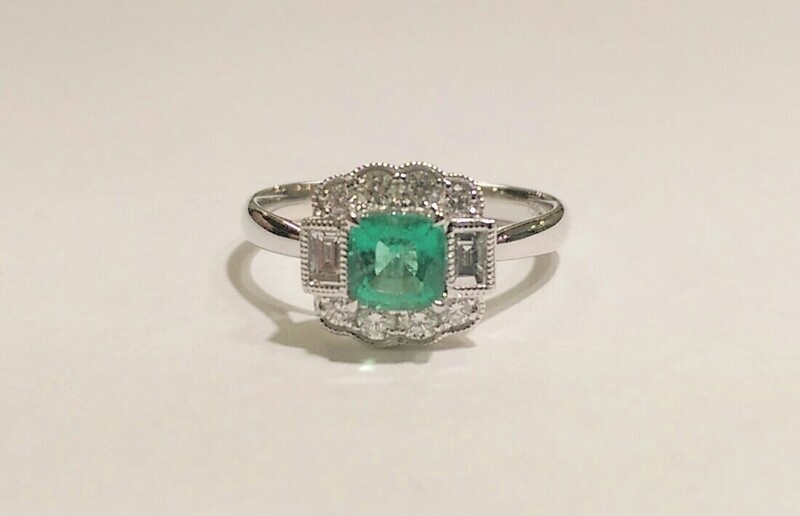 Emerald and diamond cluster ring