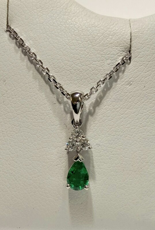 18ct white gold emerald and diamond pendant