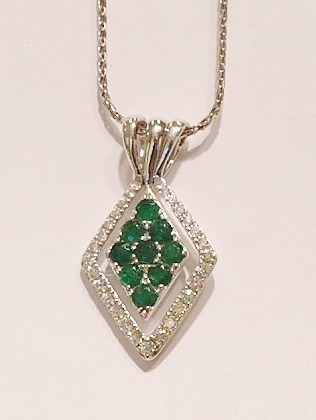 9ct white gold emerald and diamond pendant