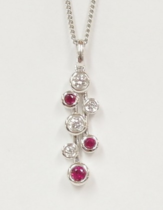 9ct white gold ruby and diamond pendant