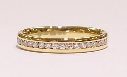 18ct yellow gold channel set diamond band