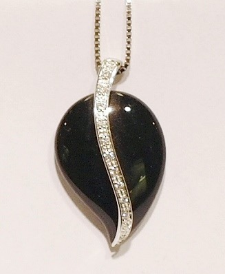 9ct white gold black onyx and diamond pendant