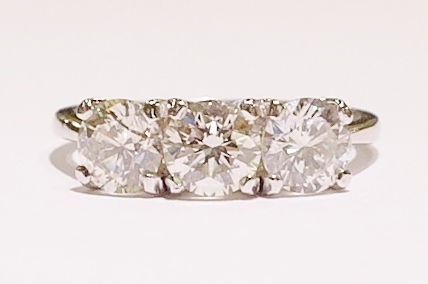 Platinum three-stone diamond ring