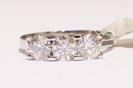 Platinum three-stone diamond ring