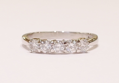 Platinum and diamond five-stone ring