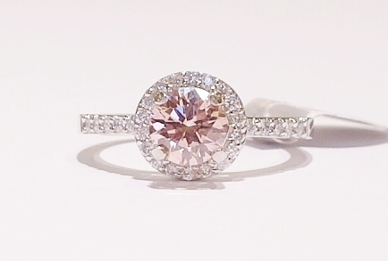Platinum and pink diamond ring