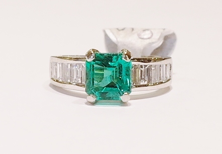 Platinum emerald and diamond ring