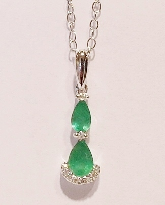 9ct white gold emerald and diamond pendant