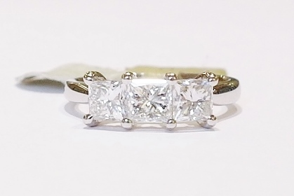 Platinum three stone princess cut diamond ring