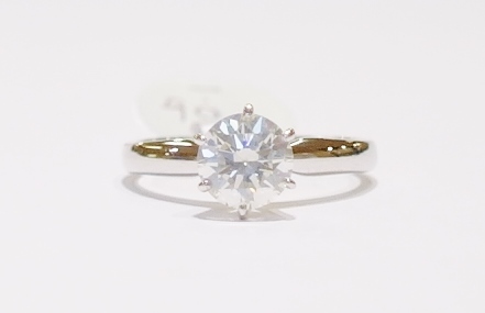 Platinum and diamond solitaire ring