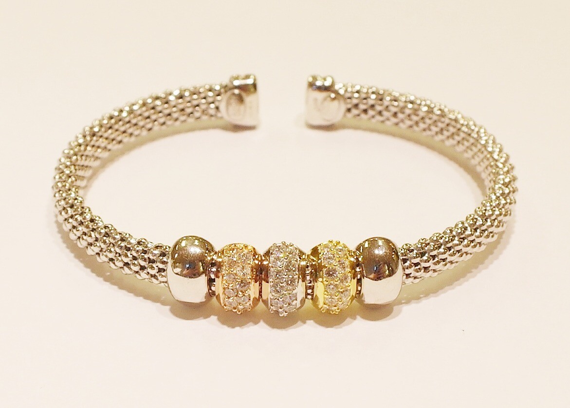 Silver open bangle with cubic zirconias