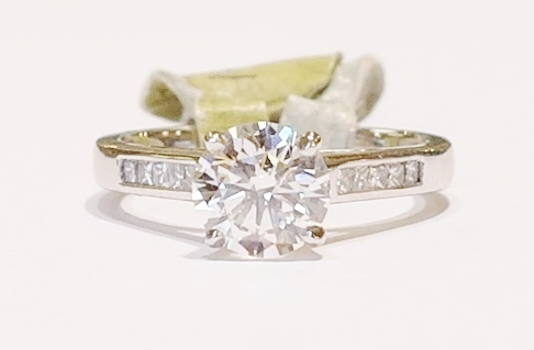 Platinum and diamond solitaire ring