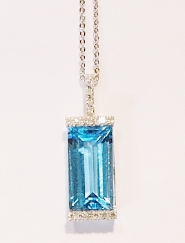 9ct white gold blue topaz and diamond pendant