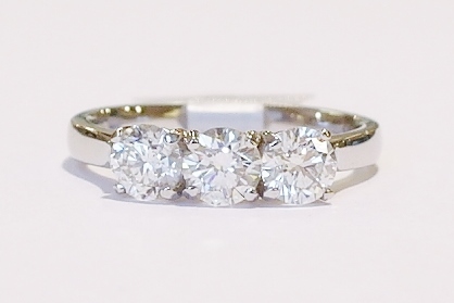 Platinum three-stone diamond ring