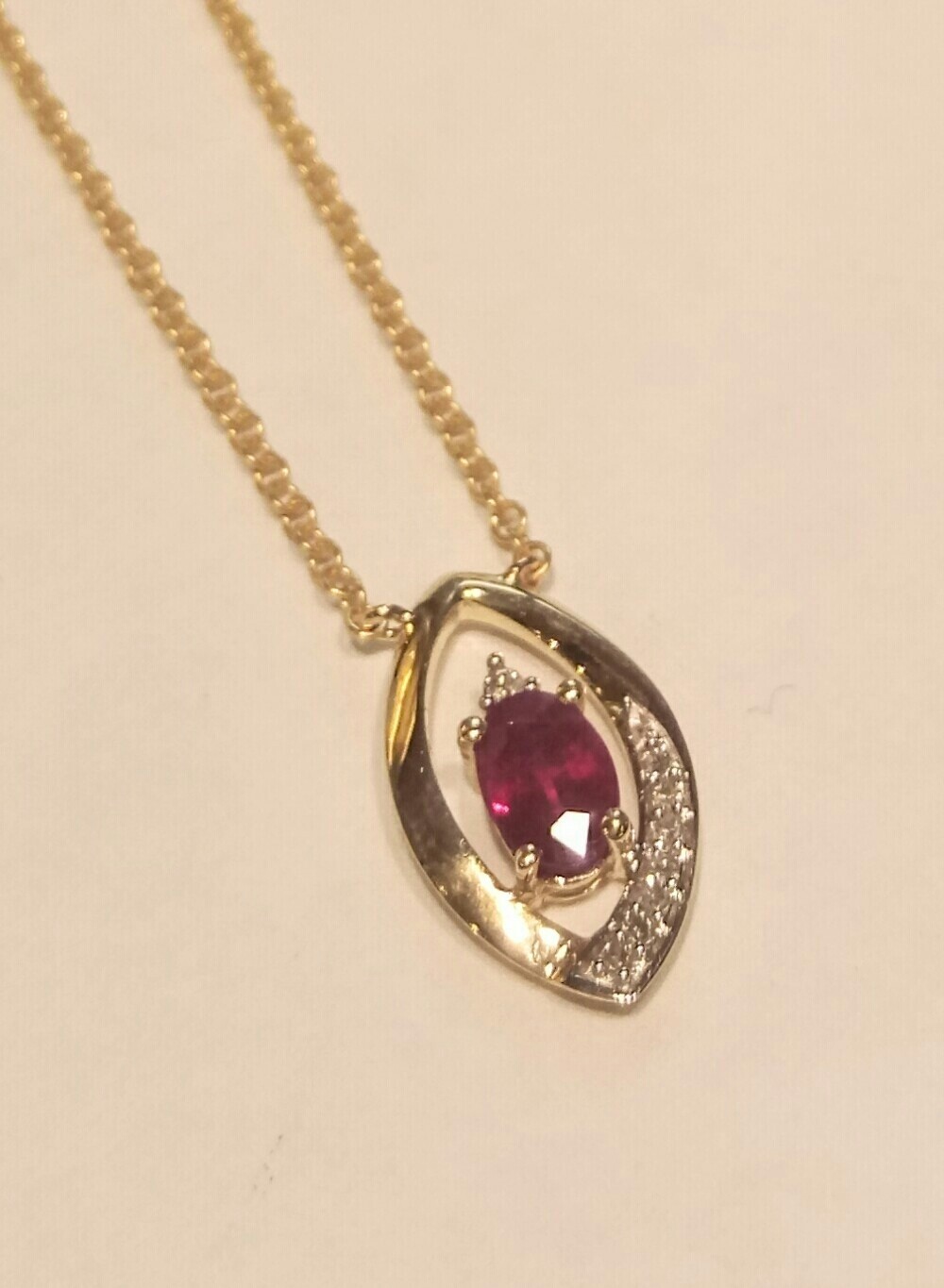 9ct gold ruby and diamond pendant