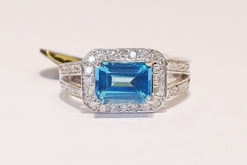9ct white gold blue topaz and diamond ring