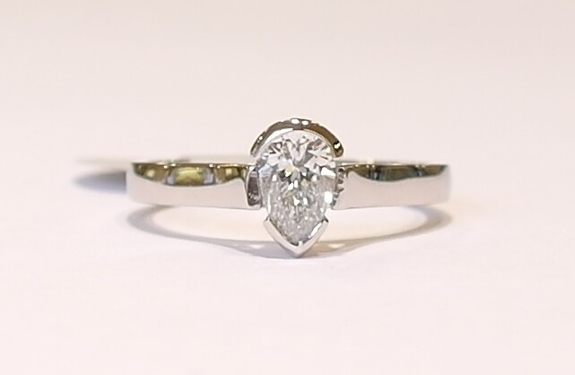 Platinum pear shaped diamond solitaire ring