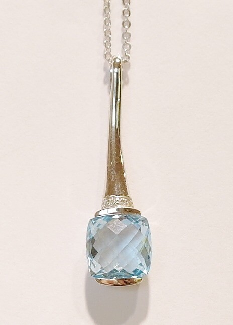 9ct white gold blue topaz and diamond pendant