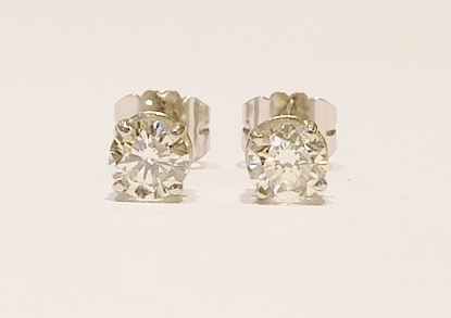 Platinum and diamond stud earrings. 1.68ct