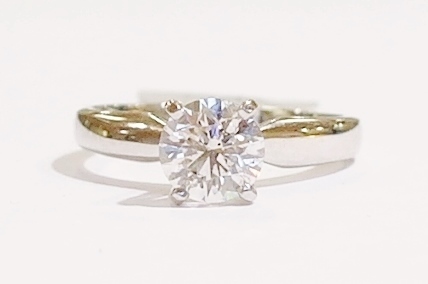 Platinum and diamond solitaire ring