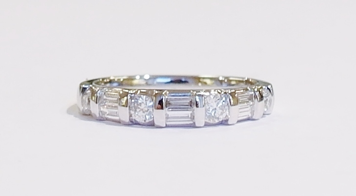 Platinum bar set diamond ring