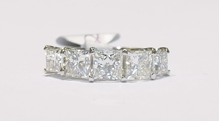 Platinum five stone princess cut diamond ring