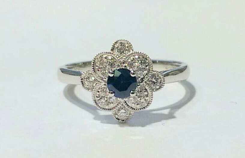 18ct white gold sapphire and diamond cluster ring