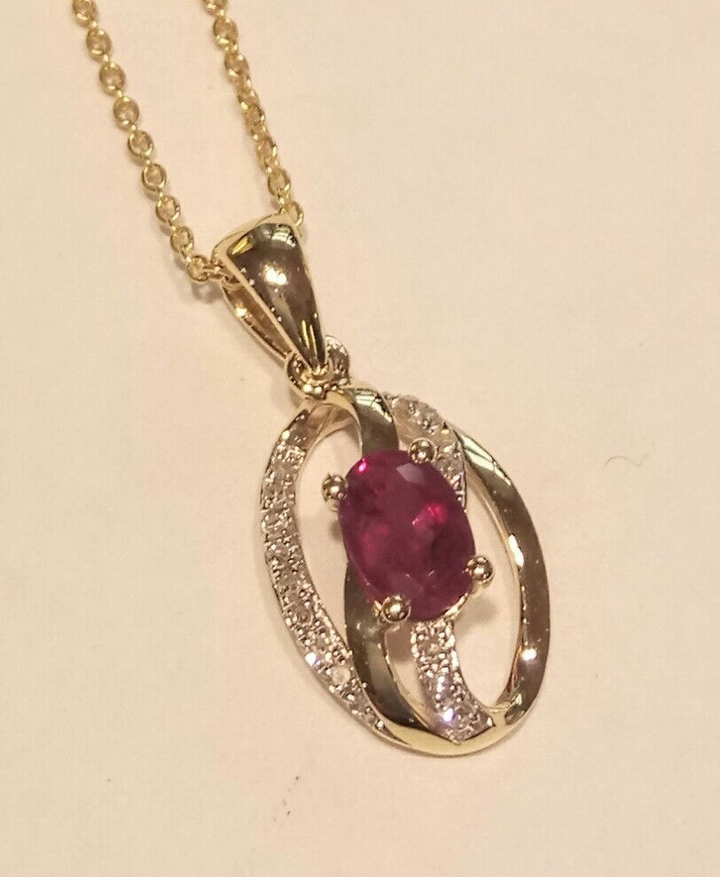 9ct gold ruby and diamond pendant