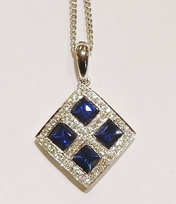18ct white gold sapphire and diamond pendant