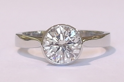 Platinum and diamond solitaire ring