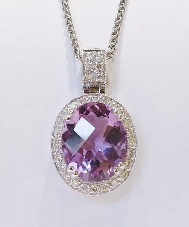 Amethyst and diamond pendant