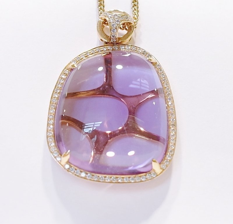Cabachon cut amethyst pendant