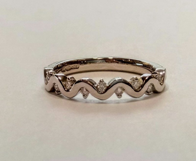 Platinum wave effect eternity ring