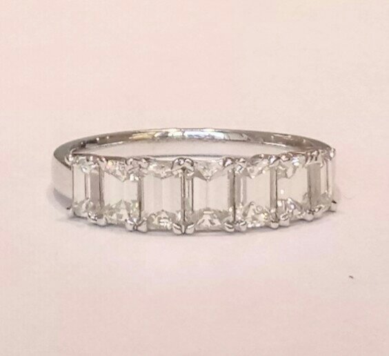 5 stone emerald cut diamond ring