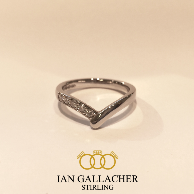 Platinum brilliant cut diamond wishbone shaped wedding ring