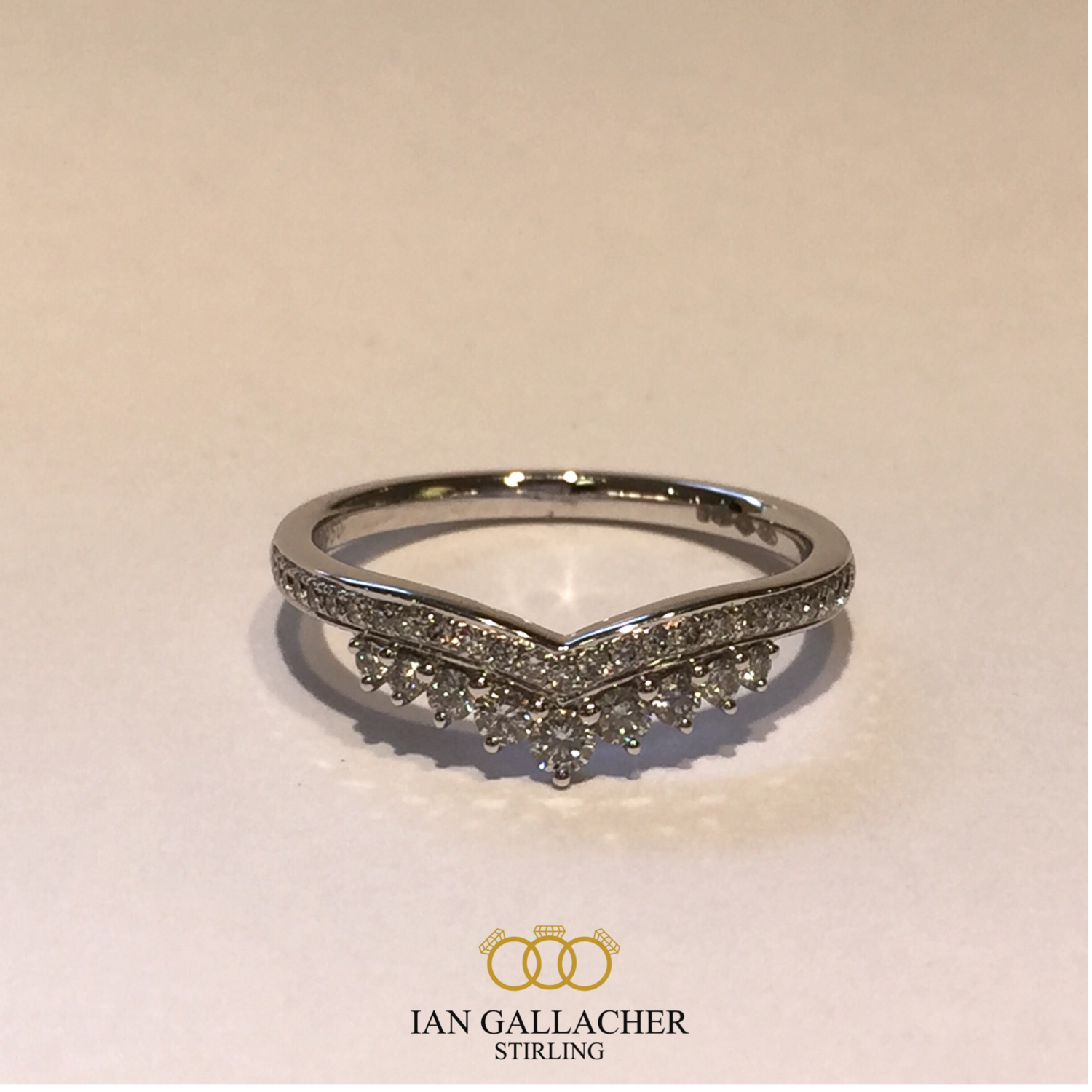 Platinum brilliant tiara style shaped  diamond wedding ring