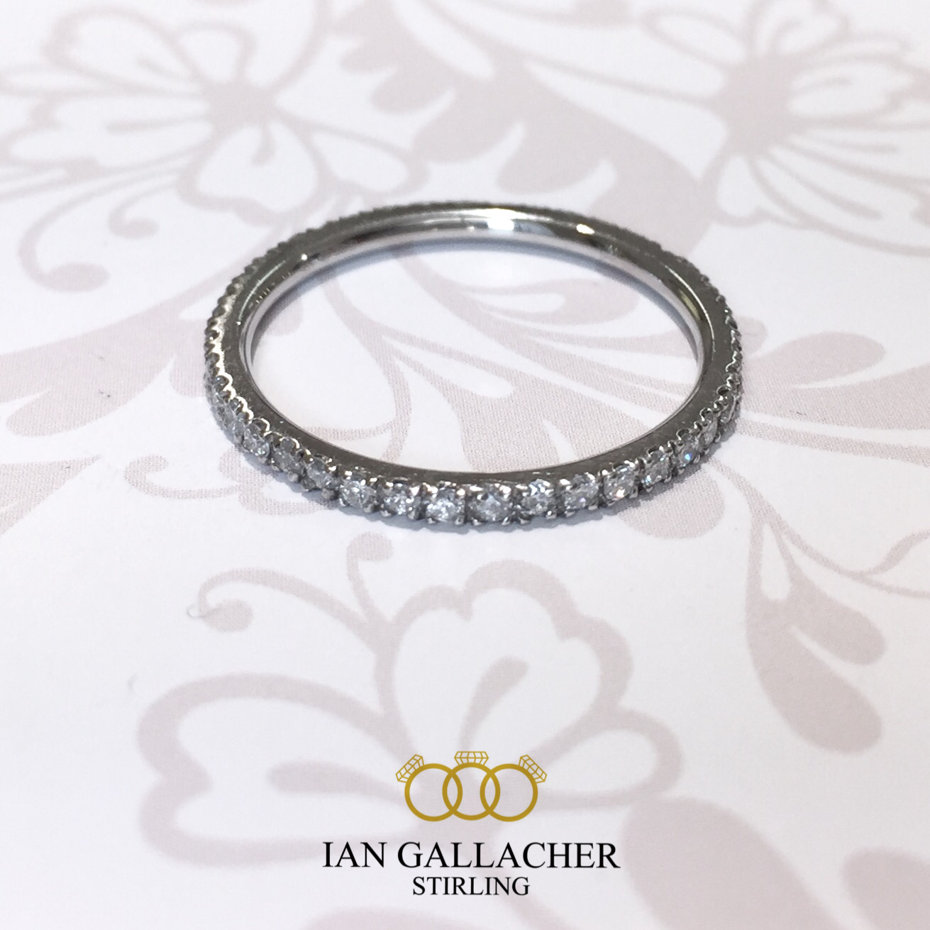 Platinum brilliant diamond slim claw set full eternity ring